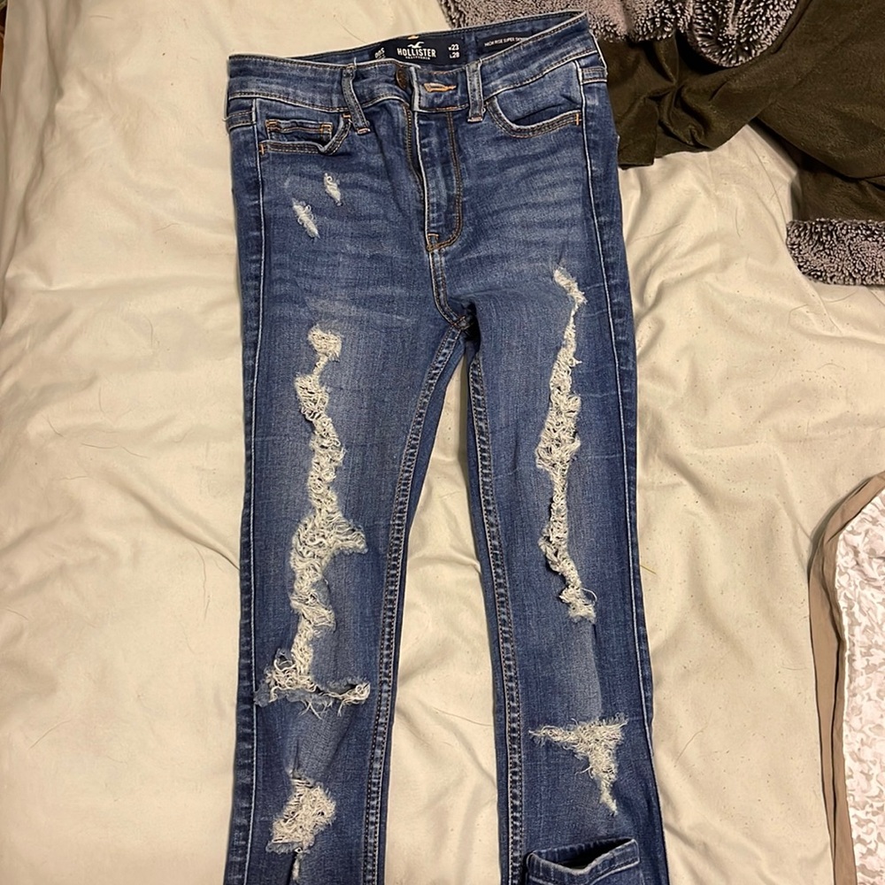 extremely ripped hollister jeans; width 23 length 28 ; fits size 00